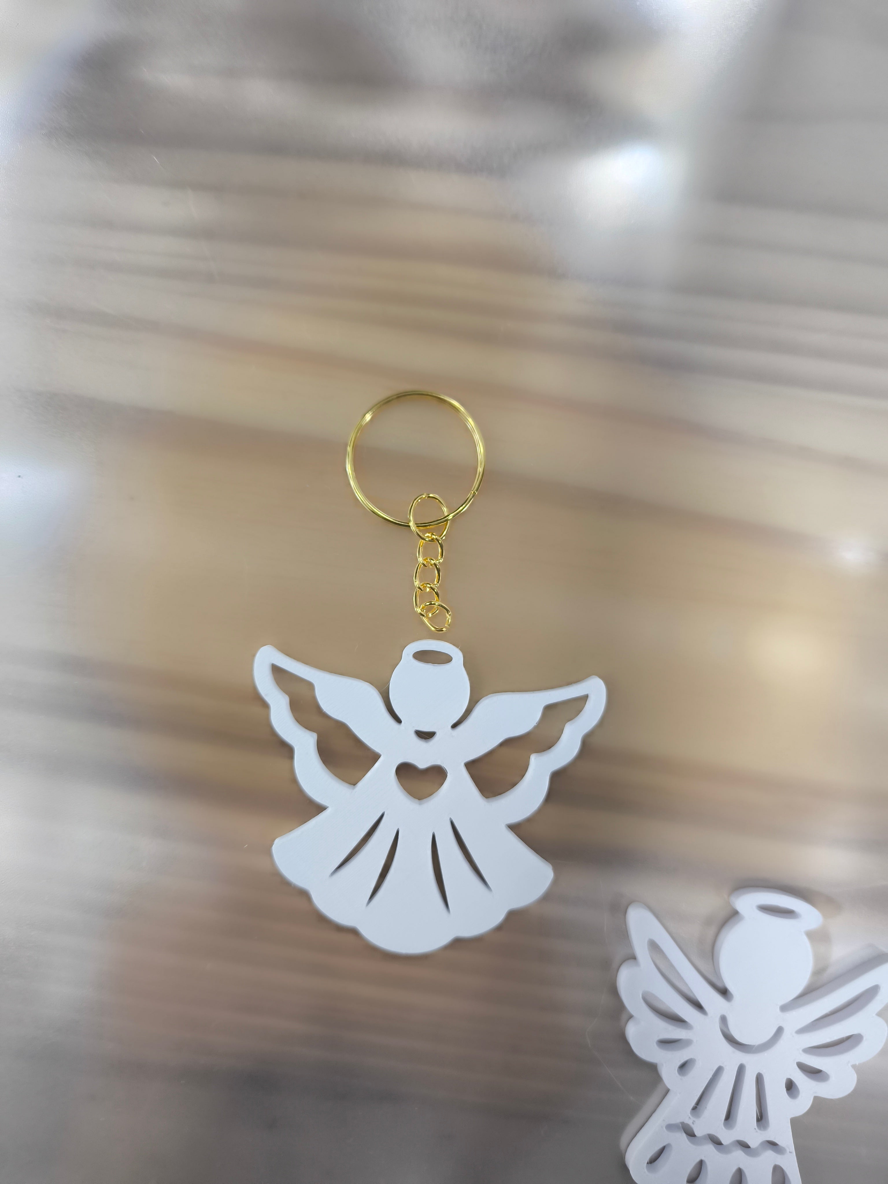 Porta-chaves Anjinho Branco – A Lembrança Perfeita para Momentos Especiais!