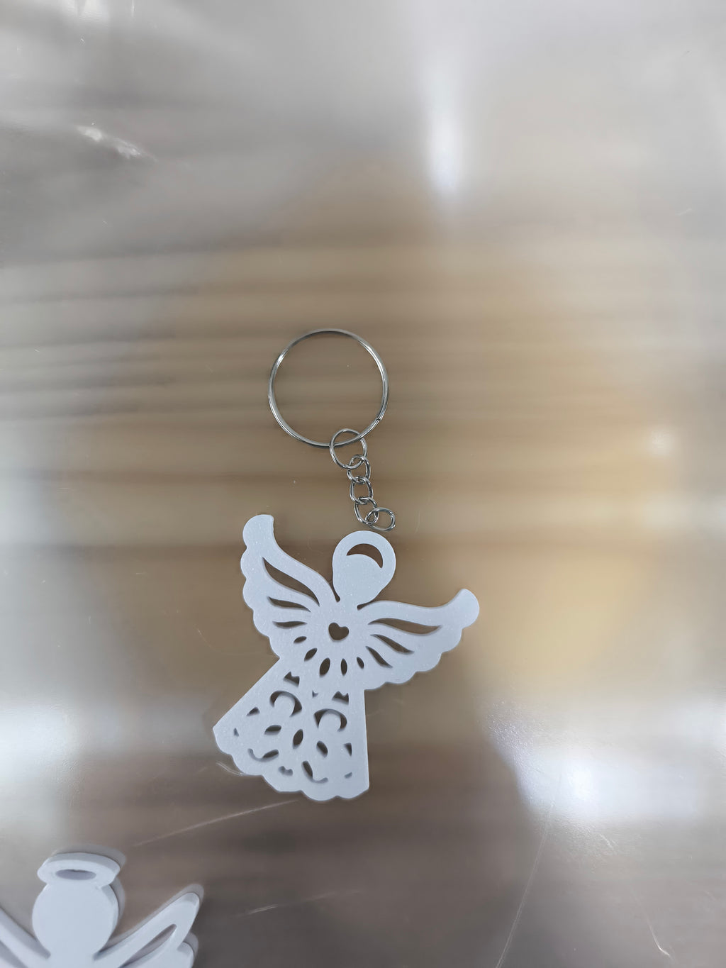 Porta-chaves Anjinho Branco – A Lembrança Perfeita para Momentos Especiais!